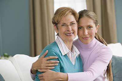 daughter hugging mother